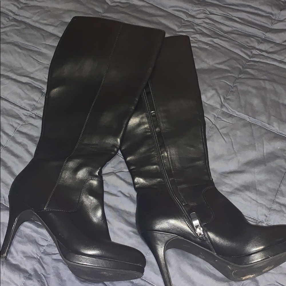 Tall black stiletto boots